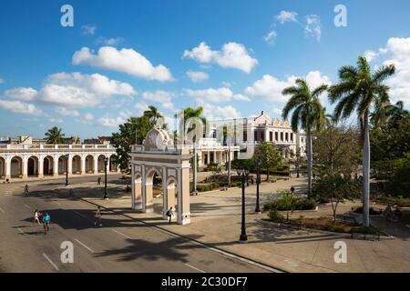 Porticoed Neoclassical buildings frame the Parque Jose Marti, Cienfuegos, Cuba Stock Photo