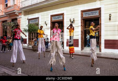 Street performers on stilts in Habana Vieja, Havana, Cuba Stock Photo