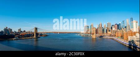 View from Manhattan Bridge over the East River to the skyline of Lower Manhattan and Brooklyn Bridge, Manhattan, New York, USA Stock Photo