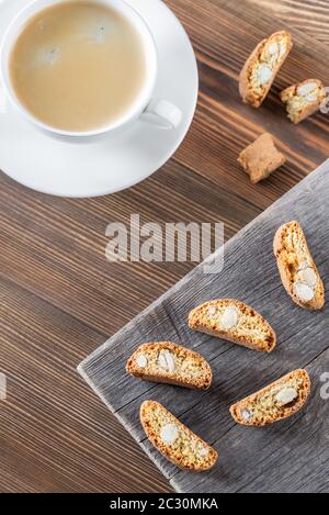 Cup of coffee with cantuccini cookies flat lay Stock Photo