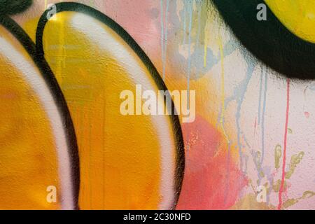 Old plastered wall with colorful drips, flows and paint sprays graffiti background Stock Photo