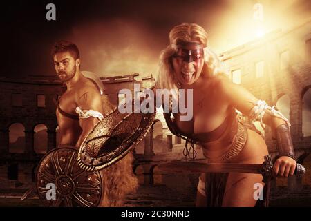 Ancient warrior or Gladiator's couple ready to fight in the arena Stock Photo