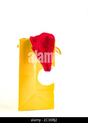 Santa Claus Christmas gift under the Christmas tree on a white background with place for text. New Year's holidays. Background image. Free space for t Stock Photo