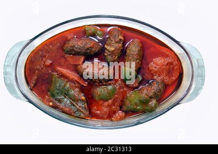 Traditional Azerbaijani Kufta bozbash - pea soup with lamb meatballs, made of minced meat and rice, zesty dried plum inside and boiled potatoes topped Stock Photo