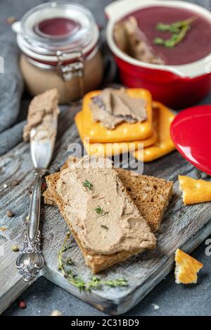 Slice of bread with homemade chicken liver pate. Stock Photo