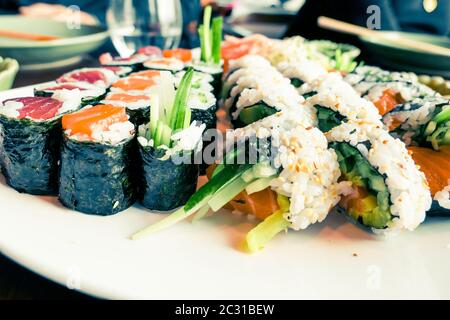 Japanese sushi in a restaurant at lunch time, asian cuisine
