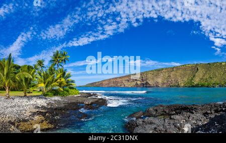 Scenic beach against cloudy sky, Napoopoo, South Kona, Hawaii Islands Stock Photo