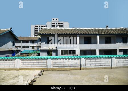 Pyongyang, North Korea. Suburb of city, typical apartments house in background Stock Photo