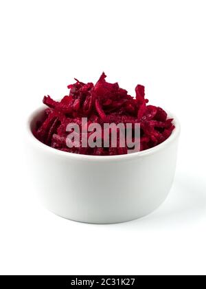 Grated beetroot in ceramic bowl isolated on white Stock Photo
