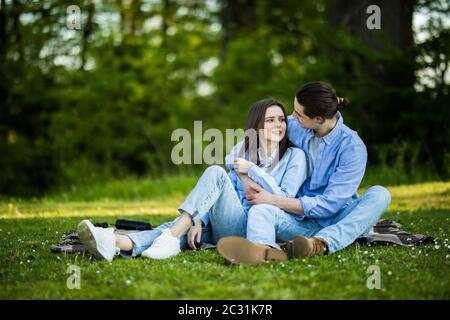 Portrait of young happy couple in love, smiling and embracing in garden,  Stock Photo, Picture And Low Budget Royalty Free Image. Pic. ESY-054292543  | agefotostock