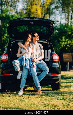 Young Multiracial Couple, Male and Female Lovers Heterosexual People  Students. Beautiful Models Posing Standing Near a Retro Car Stock Photo -  Image of model, cool: 143944252