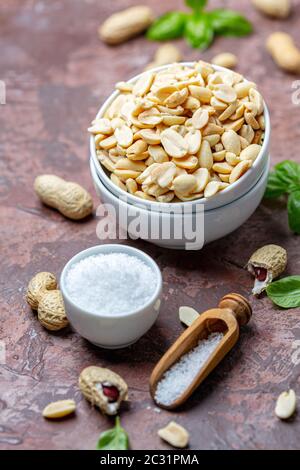 Bowl of salted peanuts. Stock Photo