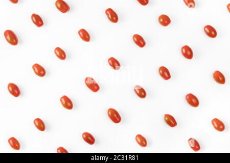 Grape tomato pattern on white background. Small tomatoes cherry top view. Stock Photo