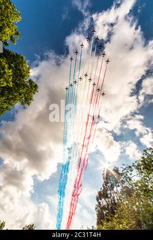 Royal Air Force Red Arrows and French Air Force Patrouille de France display teams joint flypast over London to honour the 80th anniversary de Gaulle Stock Photo