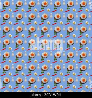 Seamless pattern with repeating breakfast objects orsini egg, whole eggs and chili peppers on a blue background Stock Photo