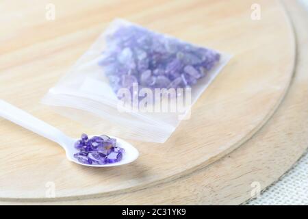 Colorful beads on a wooden surface. Various of shapes and colors to make jewelry Stock Photo