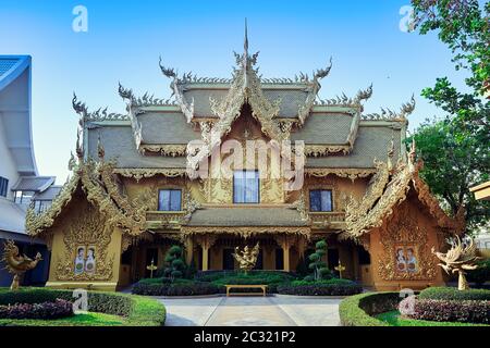 Golden toilet near Wat Rong Khun, Chiang Rai, Thailand Stock Photo