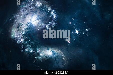 Star cluster, colliding galaxies somewhere in deep space Stock Photo