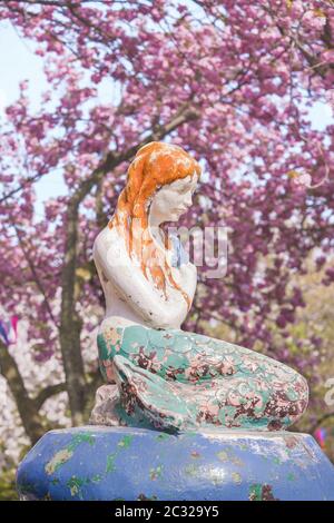 The Little Mermaid from Hans Christian Andersen's book under the cherry blossoms of Asukayama Park Stock Photo
