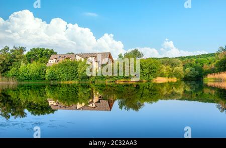 Sunny day on a calm river in summer Stock Photo