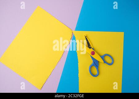 Premium Photo  Colorful zigzag scissors with color paper isolated on white
