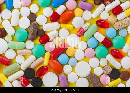 Heap of pills - medical background Stock Photo