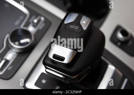 The key lies in the car on the gear shift lever. Salon premium car with keyless access. Stock Photo