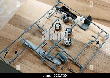 Plastic details of the scale model of a toy car. Modeling. Stock Photo