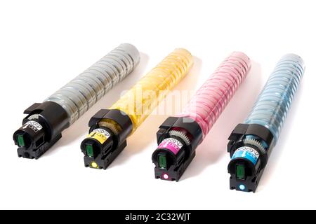 cartridges for laser printers aligned on a white background. Stock Photo