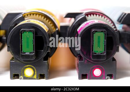 cartridges for laser printers aligned on a white background. Stock Photo