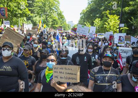 Marchers in the Flatbush neighborhood, predominantly African American, Caribbean & Haitian American, head towards Grand Army Plaza on the 18th day of demonstrations since the murder of George Floyd in Brooklyn, NY. Stock Photo