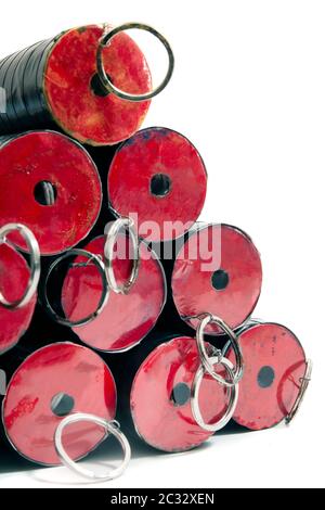 Close view of pile of smoke grenades on white background for paintball games and special effects. Stock Photo