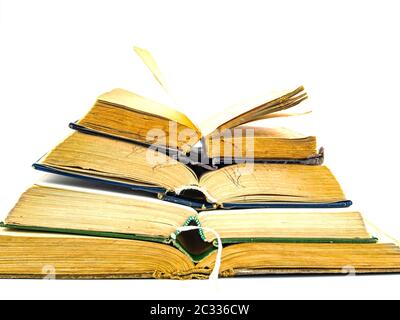 A stack of old books with place for text on a white background. Yellow Pages. Free place. Background image. Stock Photo