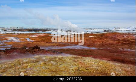 water vapour comes out of the ground in winter landscape Stock Photo