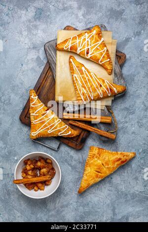 Delicious apple turnovers with cottage cheese cream. Stock Photo