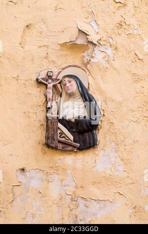 Religious icon. On stone wall of Virgin Mary and the holy child Jesus Stock Photo