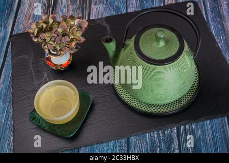 Asiatic tea arrangement on a slate slab Stock Photo