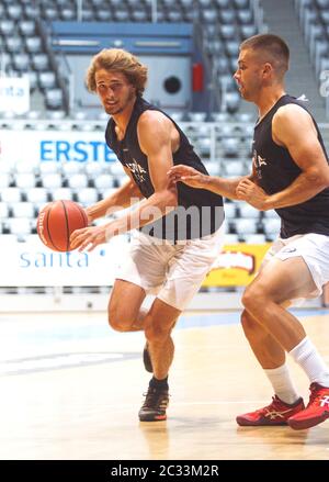 (200619) -- ZADAR, June 19, 2020 (Xinhua) -- German tennis player Alexander Zverev (L) vies with Croatian tennis player Borna Coric during a friendly basketball match ahead of the Adria Tour humanitarian tennis tournament in Zadar, Croatia, June 18, 2020. Adria Tour is organized by Serbia's tennis player Novak Djokovic in order to promote sports, positive values and fair play, and also to raise funds for those who need help. Zadar will host the tournament featuring Djokovic and top Croatian tennis players from June 19 to 21. (Marko Dimic/Pixsell via Xinhua) Stock Photo