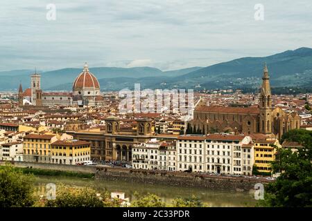 Panoramic View of the Florence with the Cathedral of Santa Maria del Fiore, the Basilica of Santa Croce, and the Arno River, Florence, Tuscany, Italy Stock Photo