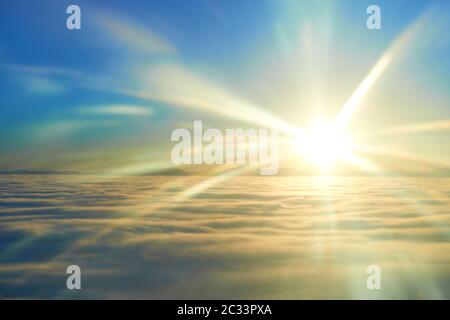 Amazing view from plane on the orange sky, sunset sun and clouds Stock ...