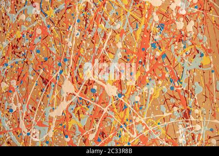 different colored spots on a yellow background created by irregular application of color. Stock Photo