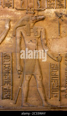 Hieroglyphic carvings of Sebek god and pharaoh on the walls of an ...