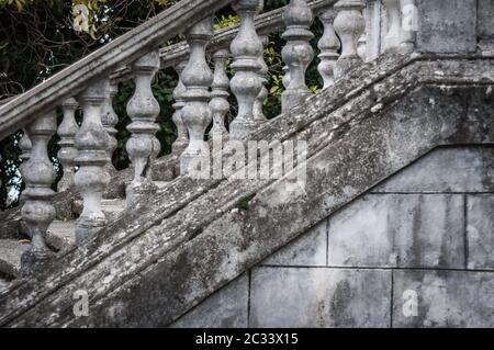 Balusters made of stone on the old historic staircase Stock Photo