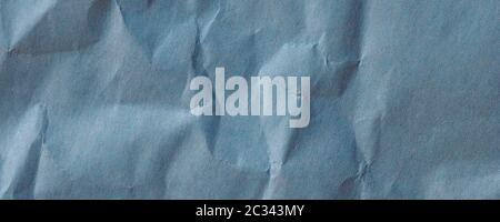 wide blue crinkled paper texture useful as a background Stock Photo