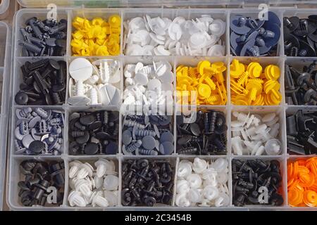 Various small plastic car parts for interior Stock Photo