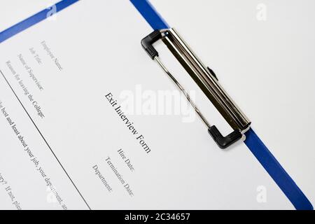 Filling and signing Exit Interview Form document Stock Photo
