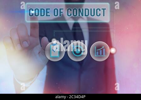 Writing note showing Code Of Conduct. Business concept for set of principles are ethics, respect, code, honesty, and integrity Stock Photo