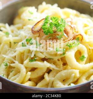 Swabian Spaetzle With Cheese And Onions Stock Photo