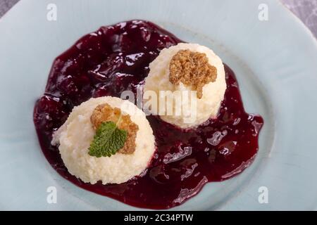 austrian curd noodles on plum sauce Stock Photo