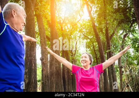 happy asian Senior couple exercising outdoors Stock Photo - Alamy